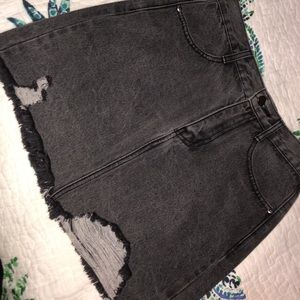 NEVER WORN WITH TAGS black denim ripped skirt